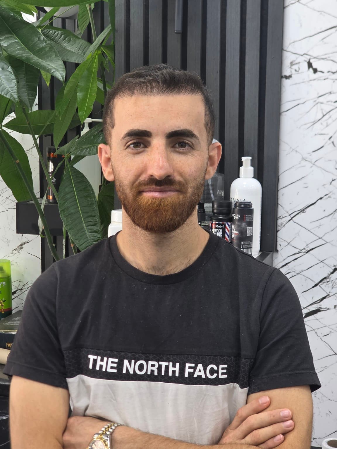A member of the Finch Barbers team